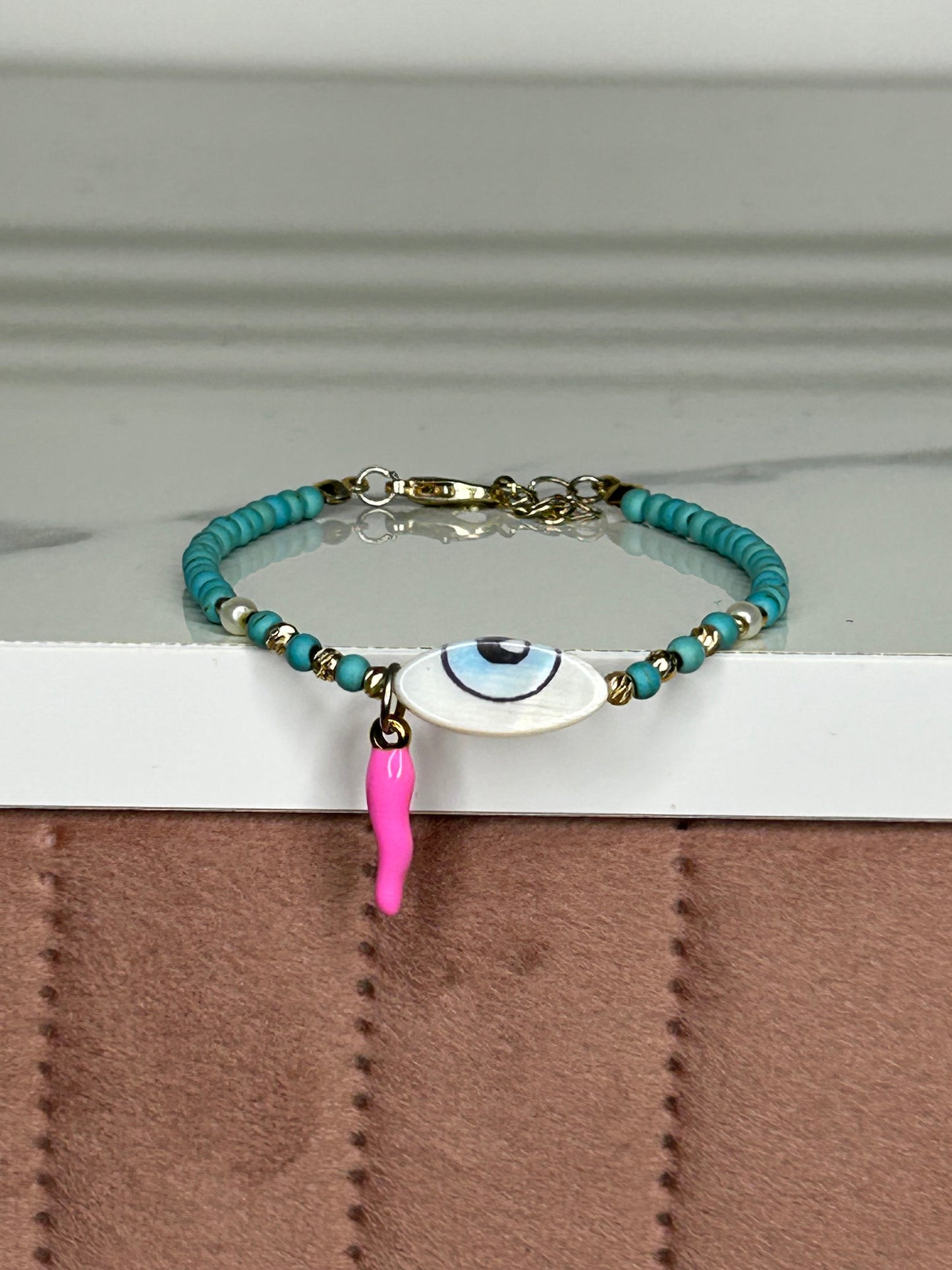 Heilstein-Perlenarmband „Turquoise Eye“, Farbe türkis/pink, Größe S/M