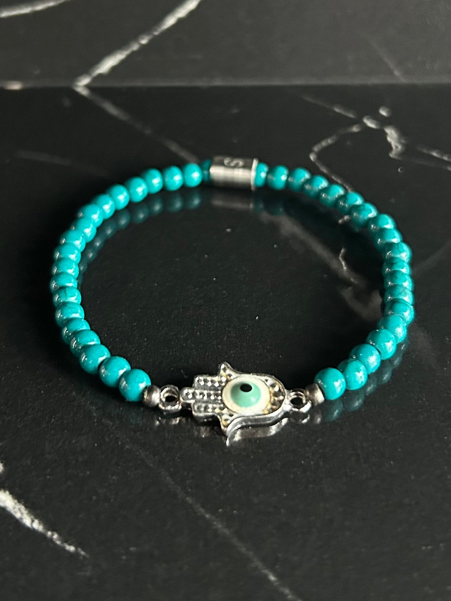 Heilstein-Perlenarmband „Heal“ mit Hamsahand und Auge, Farbe türkis, Größe S