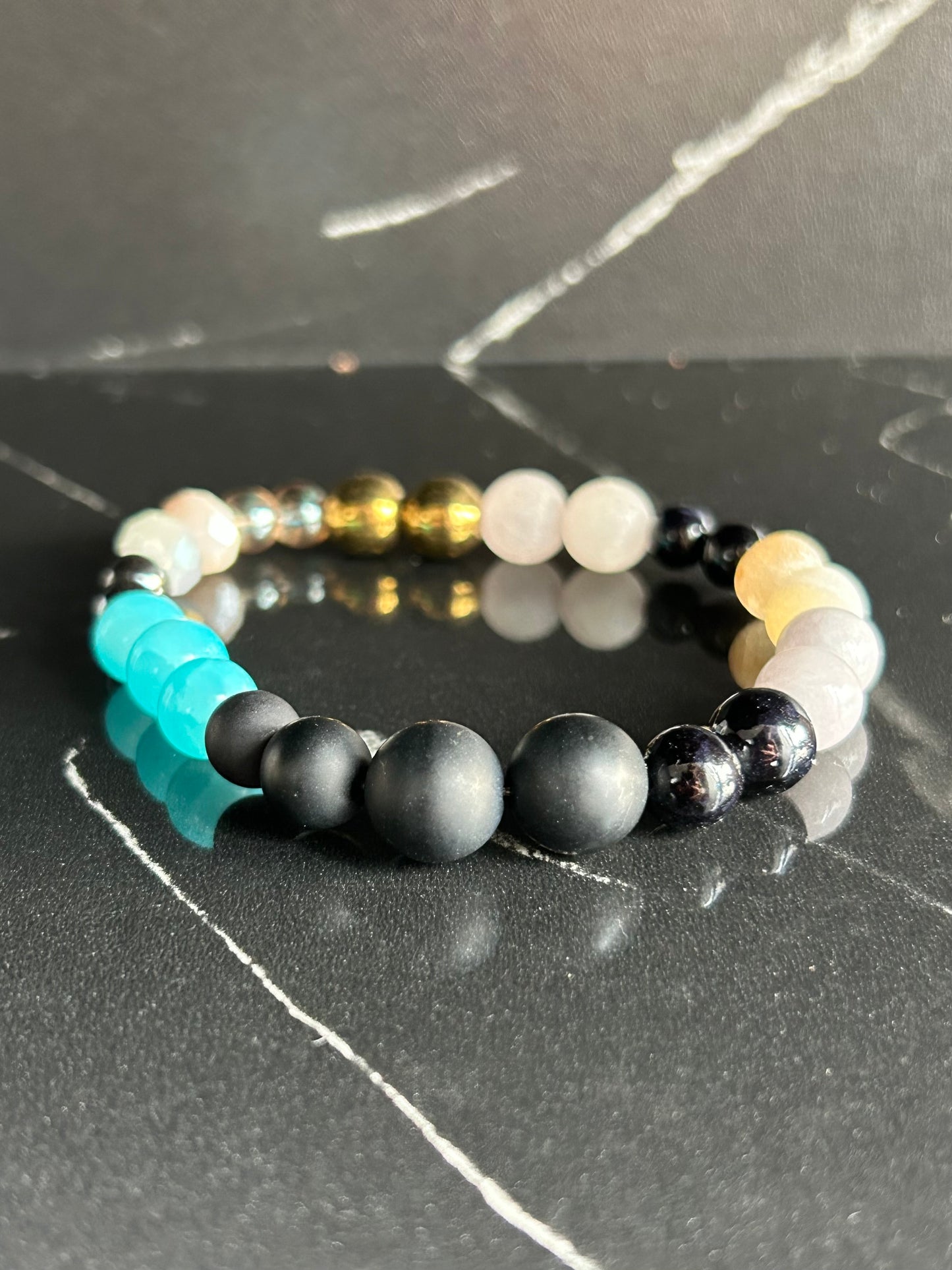 Heilstein-Perlenarmband „Heal“, Farbe bunt mit türkis/ schwarz/, Größe M